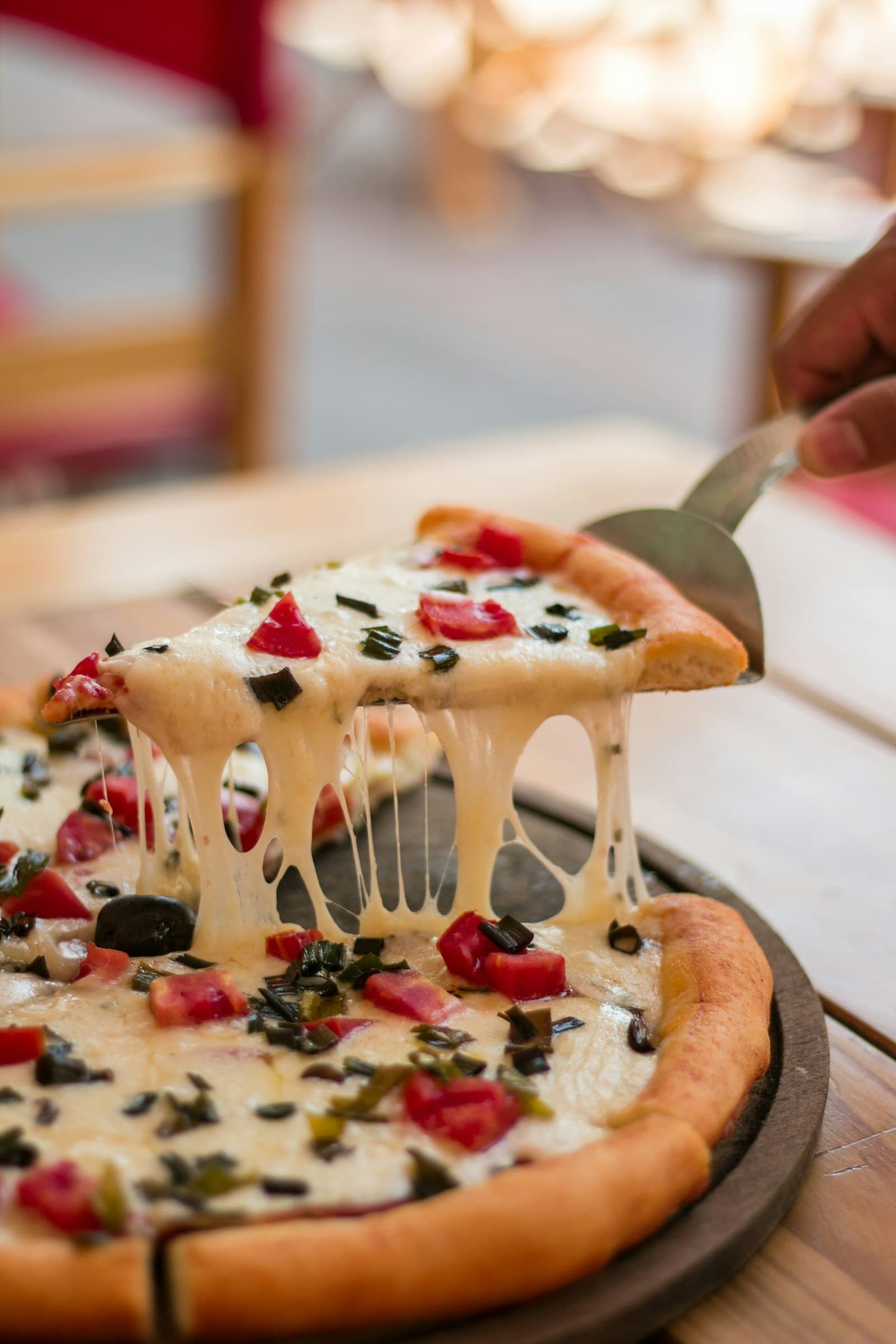 Cheese pull slice from a Love Letter pizza
